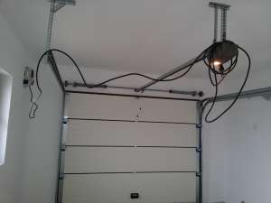usi de garaj sectionale izolate automate cu telecomanda ieftine la pret,       automatizari porti, 