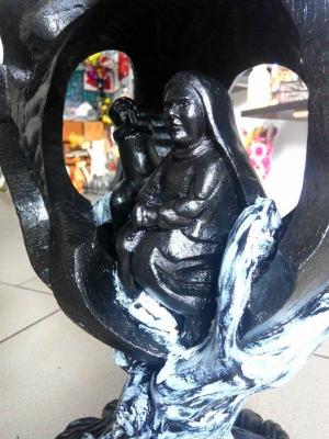 Sculptura in lemn```