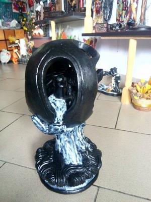 Sculptura in lemn```