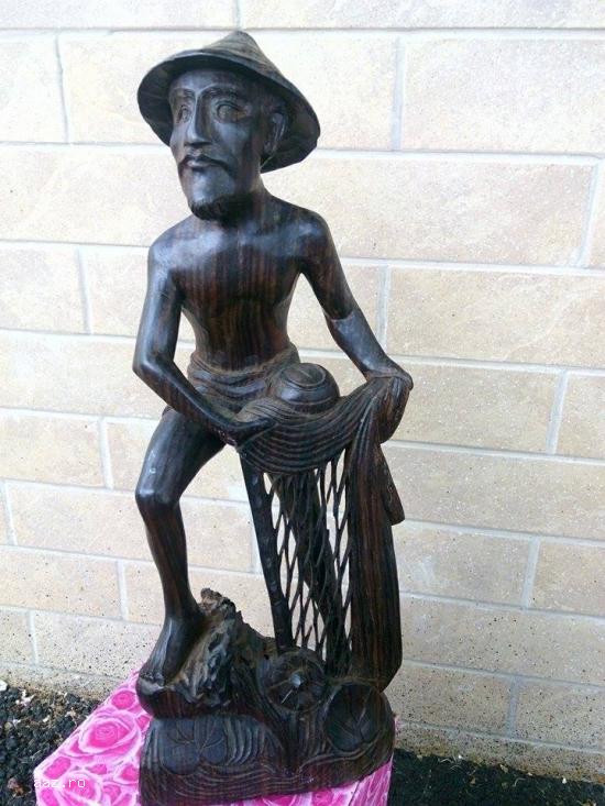 Statueta din lemn````