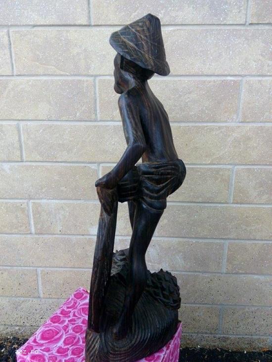Statueta din lemn````