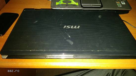 Vand laptop M S I
