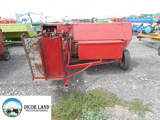 Presa balotat dreptunghiulara,  marca New Holland