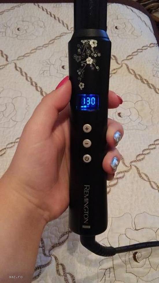 Ondulator de păr ``Pearl Wand``,   produs de firma Remington.