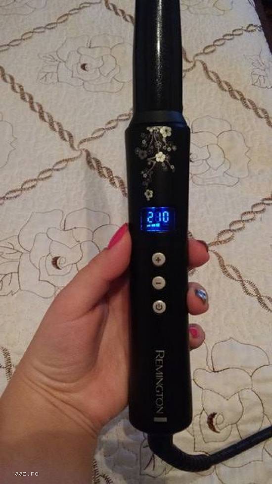 Ondulator de păr ``Pearl Wand``,   produs de firma Remington.
