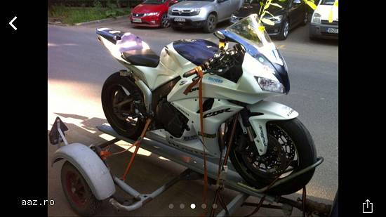 Transport motociclete solo / cu atas / ATV-uri cu remorca specializata cu rampa de incarcare si chin