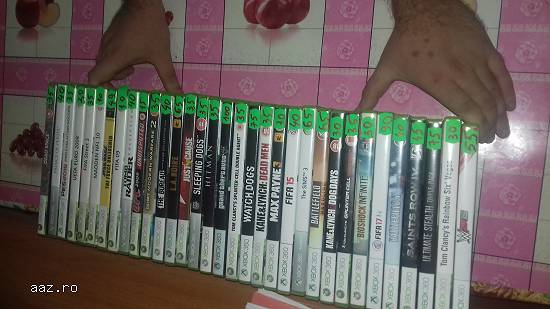 Vând x-box360+2 manete+50jocuri