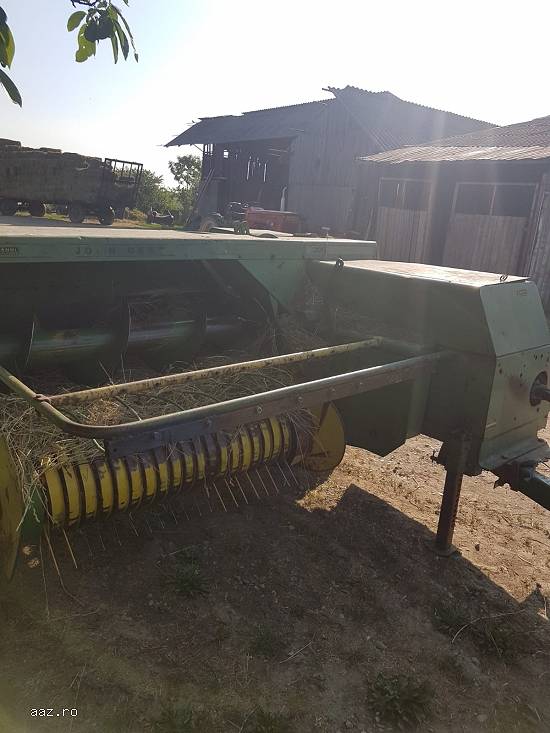 vand balotiera John Deere 386 stare perfecta.