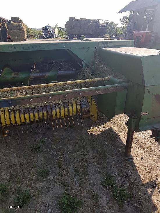 vand  o balotiera John Deere tip 386 in stare perfecta