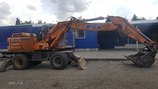 Inchiriere excavator pe pneuri 18 tone