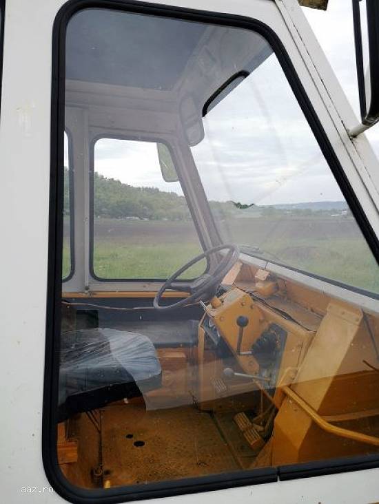 Buldoexcavator Harvester