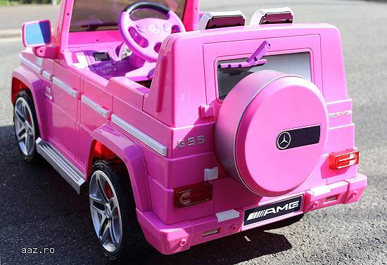 Masinuta electrica pentru copii Mercedes G55 AMG echipata CU ROTI MOI #Pink