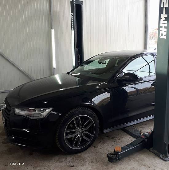 Ofer spre închiriere boxă service auto,  dotată complet