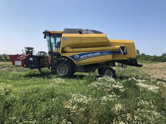 Lichidator judiciar vand Combina New Holland TC5.80 + accesorii (carucior transport H&B + header rec