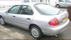 Ford Mondeo din anul 2000,   cu volanul pe partea dreapta,   perfecta stare ptr mai multe detalii ro