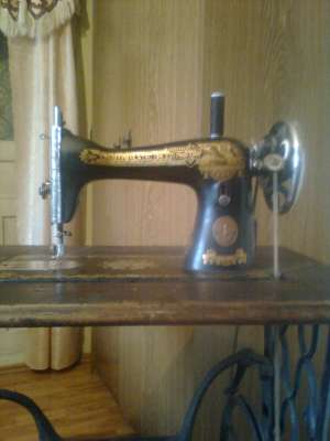 Masina de cusut Singer