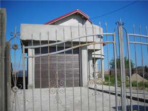 vila cu parter + mansarda 4 camere 2 bai 1 bucatarie ,   balcon  2 terase circulare garaj teren 500 