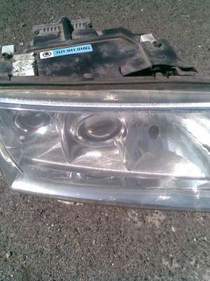 cumpar faruri xenon skoda octavia 2003