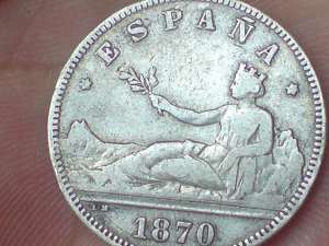 vand o moneda veche spaniola de argint 5 pesetas 1870 in stare foarte buna.
