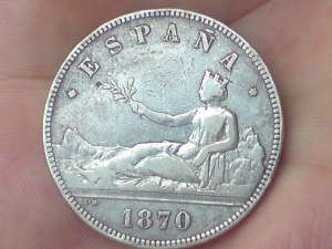 vand o moneda veche spaniola de argint 2 pesetas 1870 in stare foarte buna.