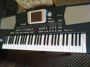 vand korg pa 500 cu tonuri si ritmuri clapa este in stare perfecta de functionare.intrare card 1 gb 