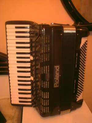VIND ACORDEON FR7 CU HUSA DIN PIELE INCARCATOR ORIGINAL 2 BATERII TONURI FACUTE LA POKEMON