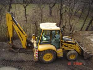 VAND BULDOEXCAVATOR KOMATSU WB-93-R2