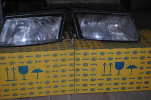 vand faruri HELLA pt VW PASSAT 1999