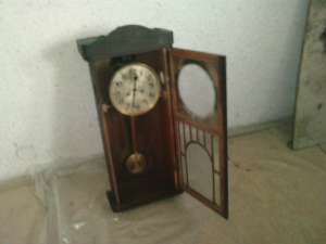 vand ceas cu pendul.....pret negociabil