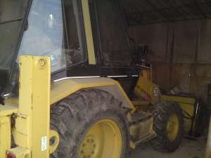 dezmembrez buldoescavator catterpillar 428b