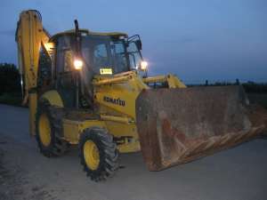 Buldoexcavator KOMATSU de vanzare