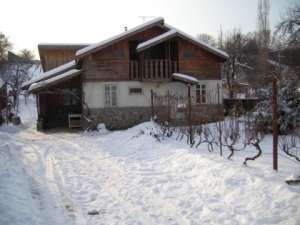vand 2 case zona turistica