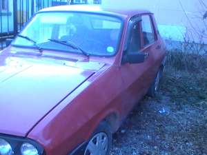 vind dacia 1310  culoare rosie