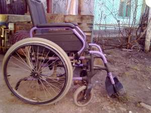 carucior pentru persoane cu handicap