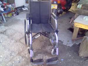 carucior pentru persoane cu handicap