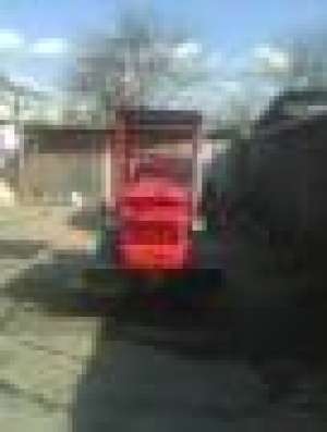vand tractor cu senile