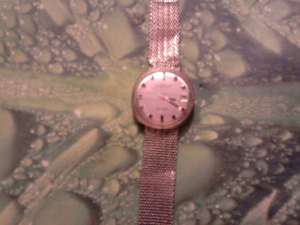 vand ceas  placat cu aur de 14 kt