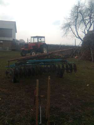 vand tractor u 650 cu plug disc si cositoare