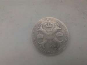 Vand monede din argint ,  cea mai veche din anul 1876