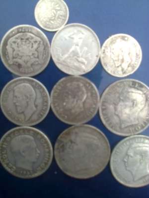 10 monede AG romanesti +50 straine la alagere