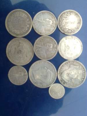 10 monede AG romanesti +50 straine la alagere