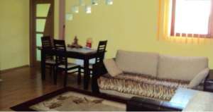 Apartament la casa 3 camere si living,    garaj cu beci