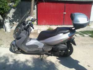 schimb scuter malaguti madison 250 cu masina fara permis