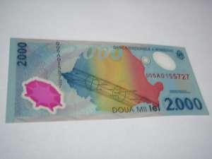 vand bancnote si monede cu eclipsa 1999