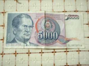 vand bancnote si monede cu eclipsa 1999