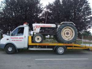 TRANSPORT TRACTOARE STIVUITOARE UTILAJE AGRICOLE NON STOP LA  