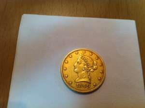 Vind moneda de aur