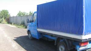 TRANSPORT MARFA+MUTARI CU AUTOUTILITARA MERCEDES CU PRELATA