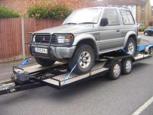Trailer dublu axe transport auto.