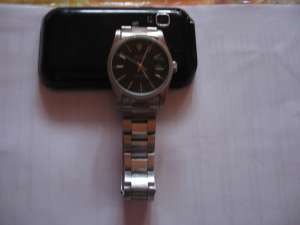 ROLEX  PERPETUAL DATE ADJUST